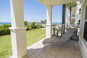 Walk out to beach and pool from your balcony!