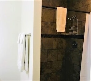 Shower, jetted bath, towels - South Harbor Condo. 3 Bedroom, 3 Bath. Boat Slip. LED Fishing Light. Large Deck. (Port Mansfield)