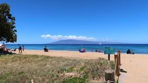 On the beach, sun-loungers, beach towels