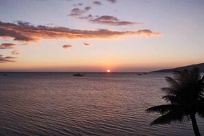 On the beach, sun-loungers, beach towels