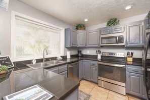 Coffee/tea maker, fridge, microwave, oven