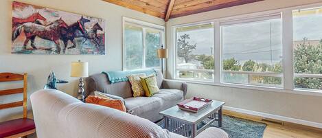 Télévision, lecteur de DVD, baby-foot, livres