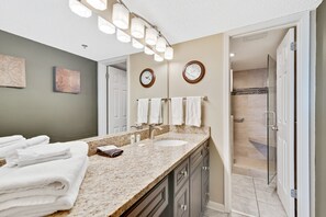 Combined shower/bathtub, hair dryer, towels - Phoenix VI 408 | Beachfront | Pools | Covered Parking | My Beach Getaways (Orange Beach)