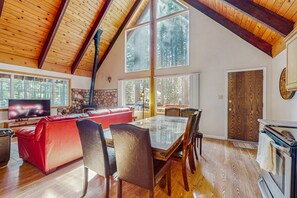 Flat-screen TV, books, stereo