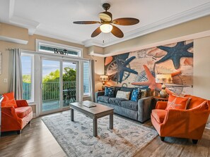 Living Area - Sleeper Sofa, Smart TV & Balcony Access - Bay View Villas 107 | Waterfront, Community Pool (Tybee Island)