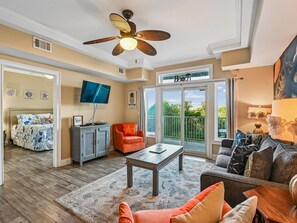 Living Area - Sleeper Sofa, Smart TV & Balcony Access - Bay View Villas 107 | Waterfront, Community Pool (Tybee Island)