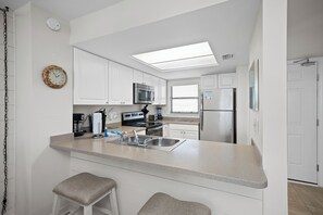 Fridge, microwave, dishwasher, coffee/tea maker