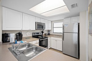 Fridge, microwave, dishwasher, coffee/tea maker