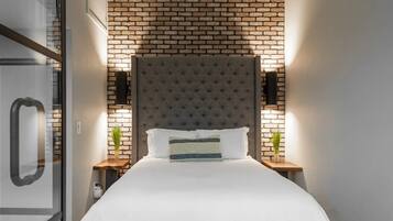 1 غرفة نوم ومكواة/لوح كي وخدمة الإنترنت وملاءات أسرّة