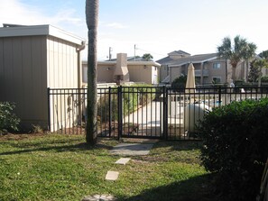Residents enjoy a secure gated entrance and ample parking.