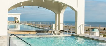 Elegant gulf escape with heated pool, hot tub, beach access, & water views