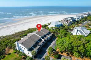 A coastal residential area with houses, a beach, and a red location marker. - Spectacular Villa, Beachfront, only 20 yards from Beach Access - 34 Beach Club (Isle of Palms)