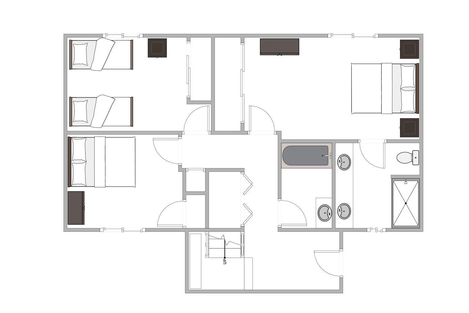 A floor plan of a hotel room with a bathroom, a kitchenette, and a seating area.