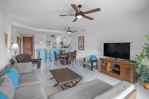 TV, DVD player, stereo - Luxurious Ground Floor Condo: Proximity to Pool, Full Access to Amenities. (Herradura)