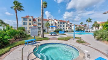 A heated pool, sun loungers