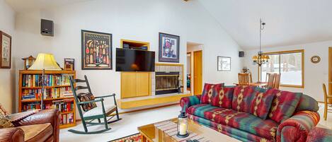 Flat-screen TV, ping pong, books