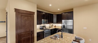 Incredible Mountain Views from the Private Deck and Walk-Out Patio