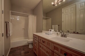 Bathtub, hair dryer, towels