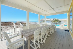 Outdoor dining - Morning Glory by GSVR | Beautiful Beachfront Home w/ Pool & Elevator + FREE Activities/Golf (Gulf Shores)