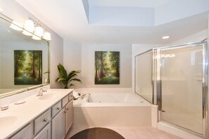 Bathtub, jetted tub, hair dryer, towels