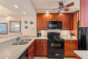 Coffee/tea maker, fridge, microwave, oven