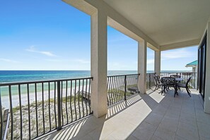 A balcony with a view of the beach and ocean. - Luna Sol - Beachfront Duplex with Private Pool Area & Beach Access (Destin)
