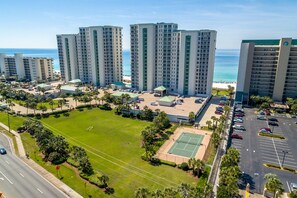 Experience the beachfront location and enjoy access to the ocean from this high-rise complex, featuring a tennis court and green space.