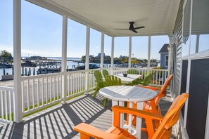 Outdoor dining - Beautiful home-waterfront, beach, pools, family fun & pets! (Long Neck)