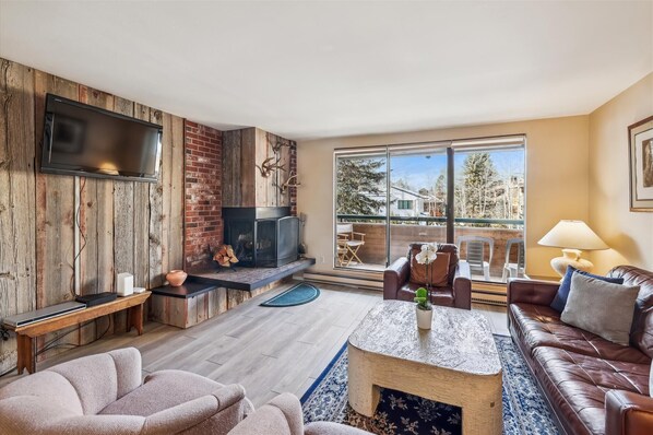 Flat-screen TV, fireplace