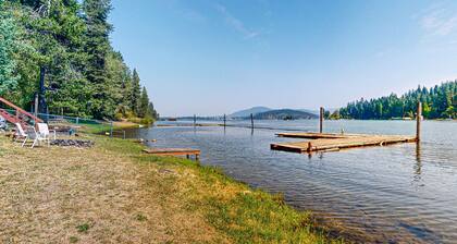 Grand waterfront home w/ decks offering lake views plus boat slip & nearby dock