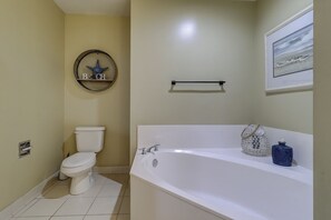 Bathtub, jetted bath, hair dryer, towels