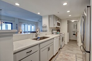 Fridge, microwave, oven, stovetop - DR 1309 – Getaway to this oceanfront condo with pool and direct beach access (Wrightsville Beach)