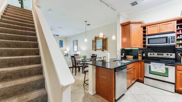 Coffee/tea maker, fridge, microwave, oven