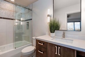 Shower, hair dryer, shampoo