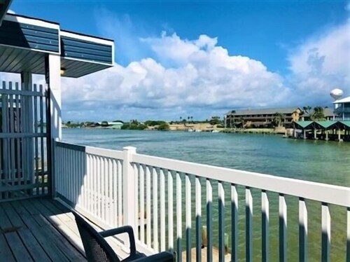 Three Bedroom, Three and a Half Bath. Private Boat Slip. Communal Pool.