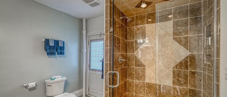Shower, hair dryer, towels, soap
