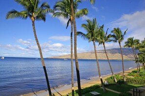 On the beach, sun-loungers, beach towels