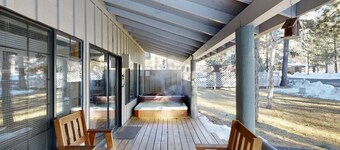 Home with spacious deck with private hot tub & SHARC access