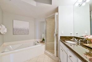 Shower, jetted bath, hair dryer, towels
