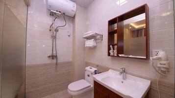 Shower, free toiletries, hair dryer, slippers
