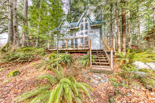 Riverfront home close to skiing & fishing with beach access & huge VHS library