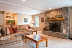 Smart TV, fireplace, DVD player, books