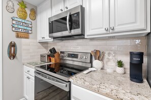 Fridge, microwave, oven, stovetop - ⛱️Beach Front~Pool~Hot Tub~Spa~Gulf Views~Silver Shells~2BR St. Lucia 802 (Destin)