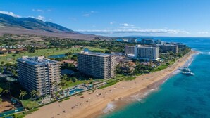 A coastal hotel with multiple high-rise buildings, a beachfront, and a clear view of the ocean. - Whaler 523 - Amazing Oceanfront on Kaanapali Beach (Lahaina)