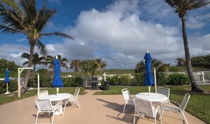 Outdoor dining - Direct Beach Access - Poolside Coastal Condo (Palm Beach Shores)
