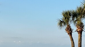A golf course with a clear view of the ocean and a distant shoreline. - Bay View,  Villa Golf Cart, Private Deck, Blue Bayou 270 Fairways (Miramar Beach)