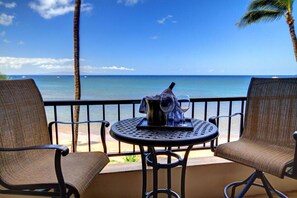 Enjoy a peaceful ocean view from this balcony, perfect for relaxing or dining al fresco.