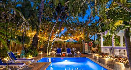 Multi-home tropical paradise with large, heated pool, & wraparound sundeck