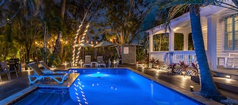 Multi-home tropical paradise with large, heated pool, & wraparound sundeck