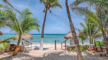On the beach, sun loungers